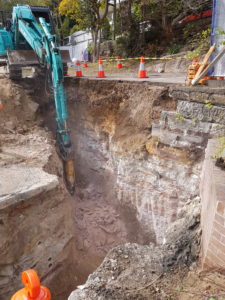 Trench excavation through hard rock stratum in Hunters Hill.